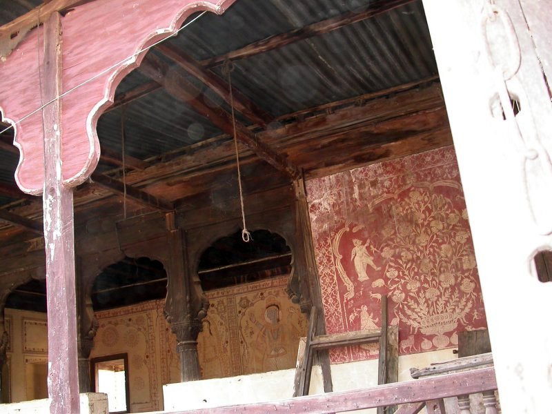 White-on-red Fresco work